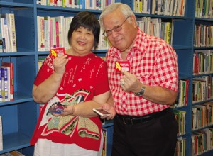 Loving the library card, Ann and George Fujioka use it to access online and physical resources in the library.