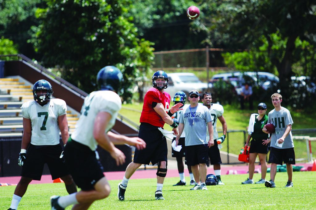 Football Players Scrimmage - Generations Magazine - June - July 2013