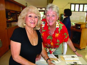 WELCOME CREW: Helen Wagner (left) and Barbara Service are among the friendly faces at monthly Kokua Council meetings.