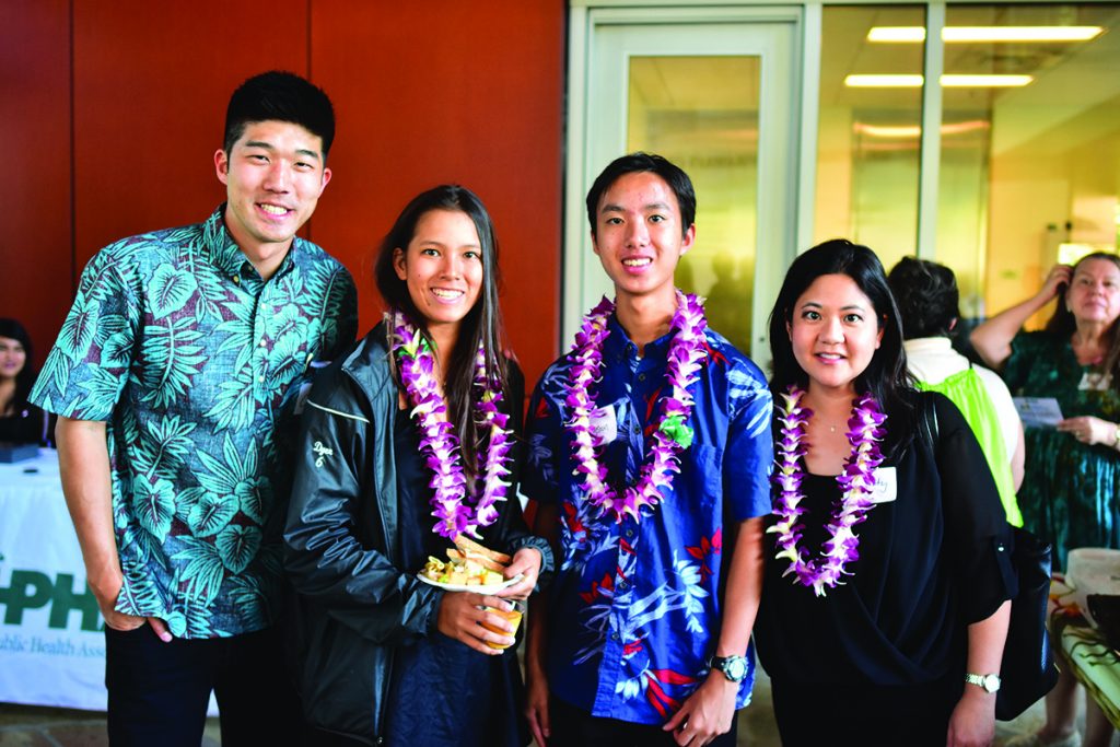 From Left: Colby Takeda; ‘Iolani One Mile Project students Marley Dyer and Bryson Choy; and Christy Nishita, PhD.