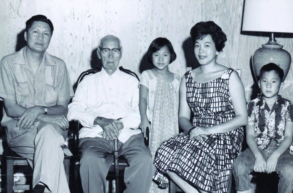 Three generations of City Mill Ltd.: When Steven and Carol were children, their grandfather, C.K. Ai, lived in their home. Following the wisdom of elders, helping the community and respecting others became a family and business culture to be celebrated. (L–R) David Ai, C.K Ai, Carol Ai, Lani Ai and Steven Ai.