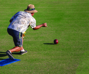 Photo of man lawn bowling