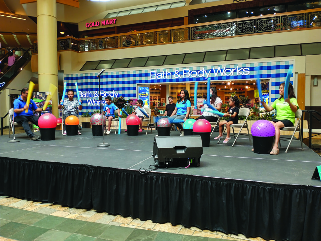 Got rhythm? This intergenerational group of rhythmic drummers sure do! Led by Steven Santiago of Honolulu Parks & Recreation (far left), they gave a demo at the Generations Senior Fair at Windward Mall on May 19. 